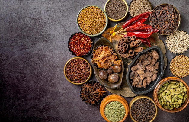 top-view-various-indian-spices-seasonings-table_181624-58725